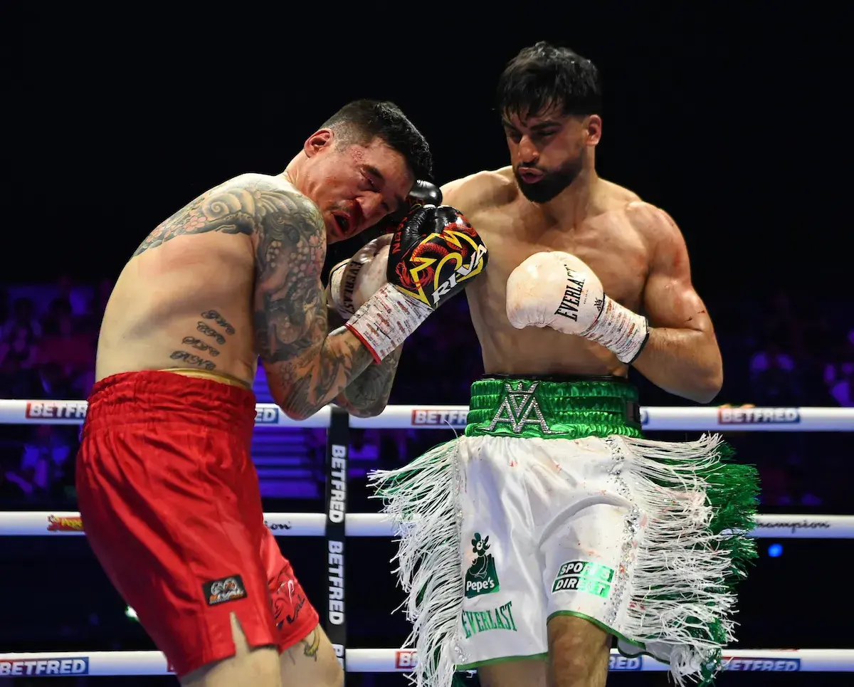 Adam Azim lands one of many hard right hands on Steve Claggett