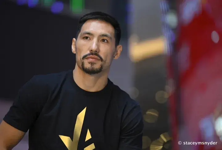 Janibek Alimkhanuly at a press conference.
